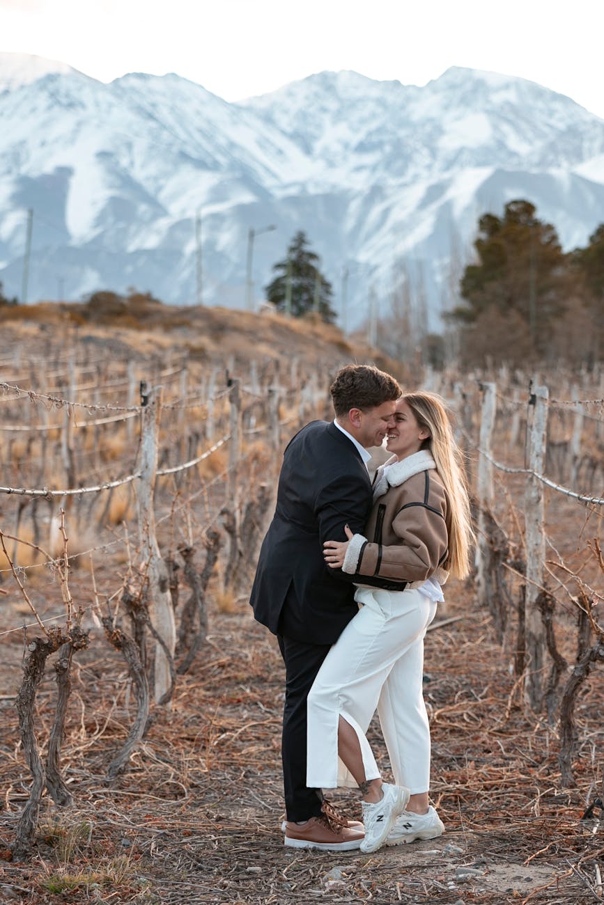 Lush vineyards in Mendoza, Argentina, with the majestic Andes mountains in the background